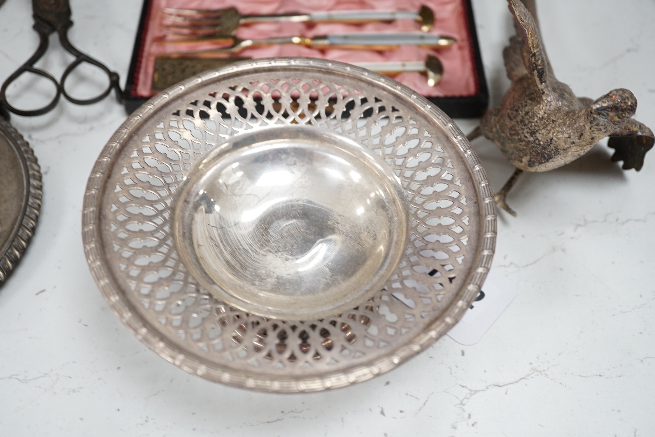 Three plated trays, a cased three piece mother of pearl handled cutlery set, etc.